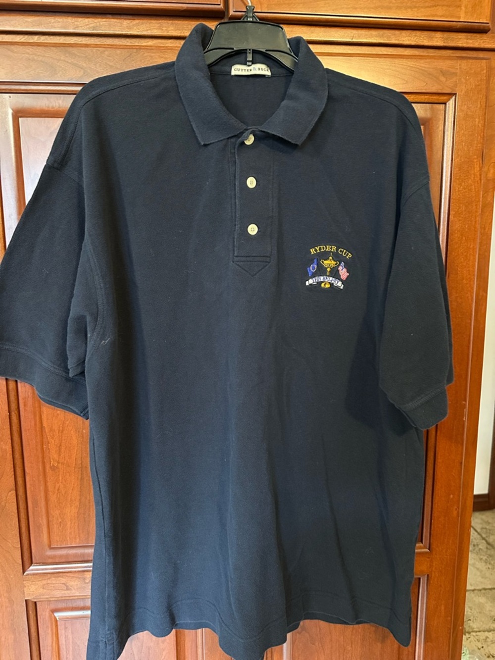 Cutter & Buck Navy Polo with Ryder Cup The Belfry Embroidered Crest